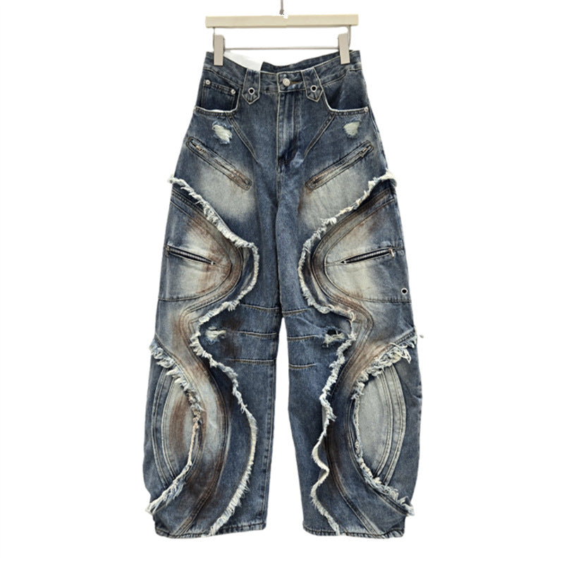 Washed curved-patterned mud-dyed jeans