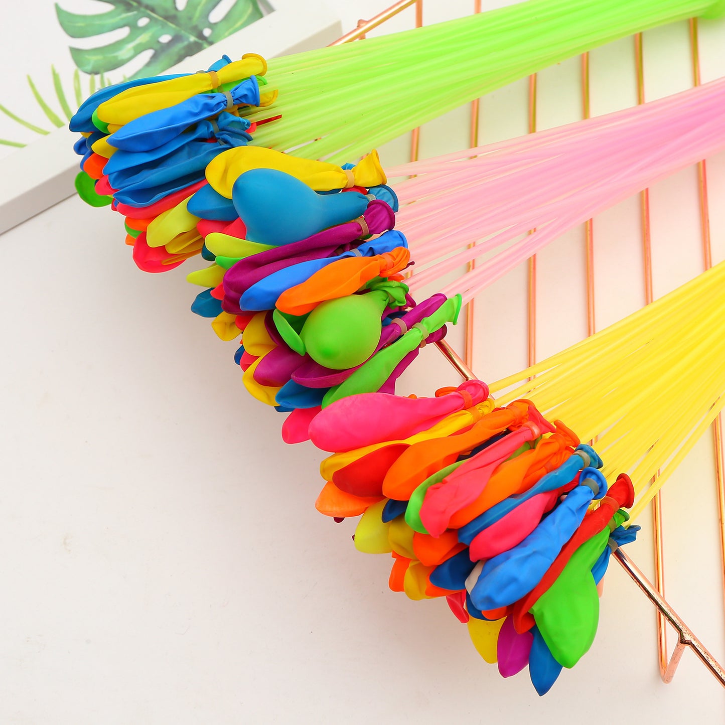 Water-filled burst bead air balloon automatic sealing device