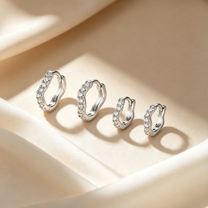Wave-shaped diamond-studded ear clips
