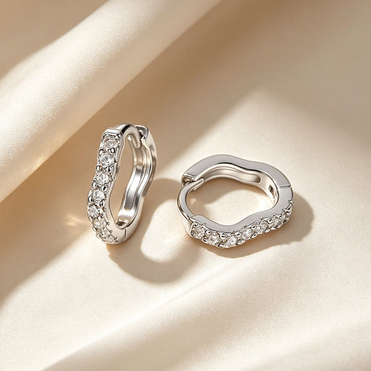 Wave-shaped diamond-studded ear clips