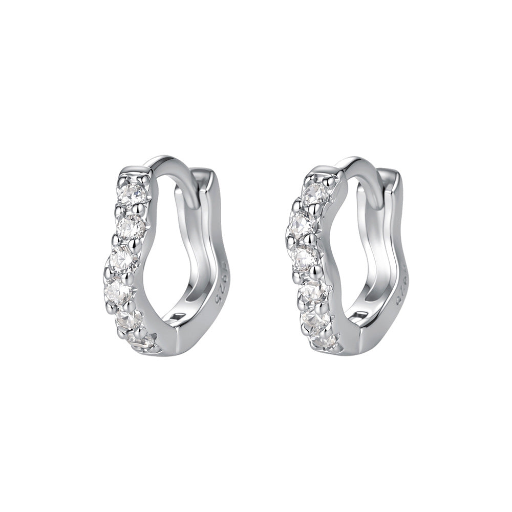 Wave-shaped diamond-studded ear clips