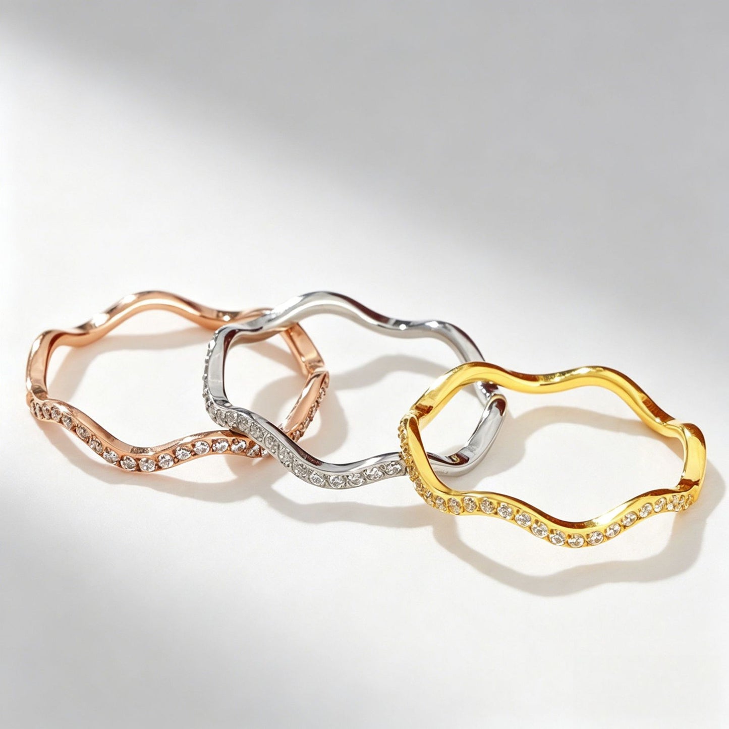 Wavy diamond-studded ring