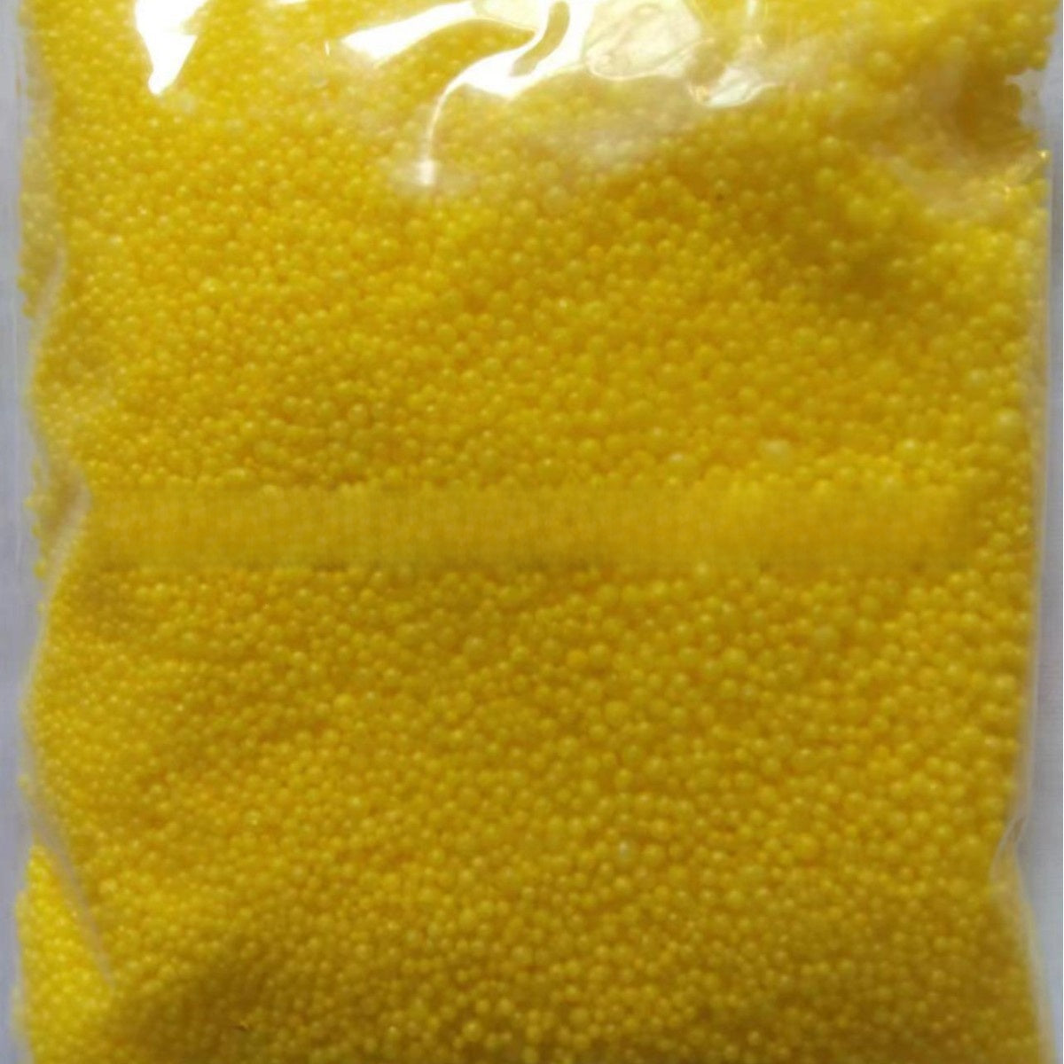 Wax sand candle particles