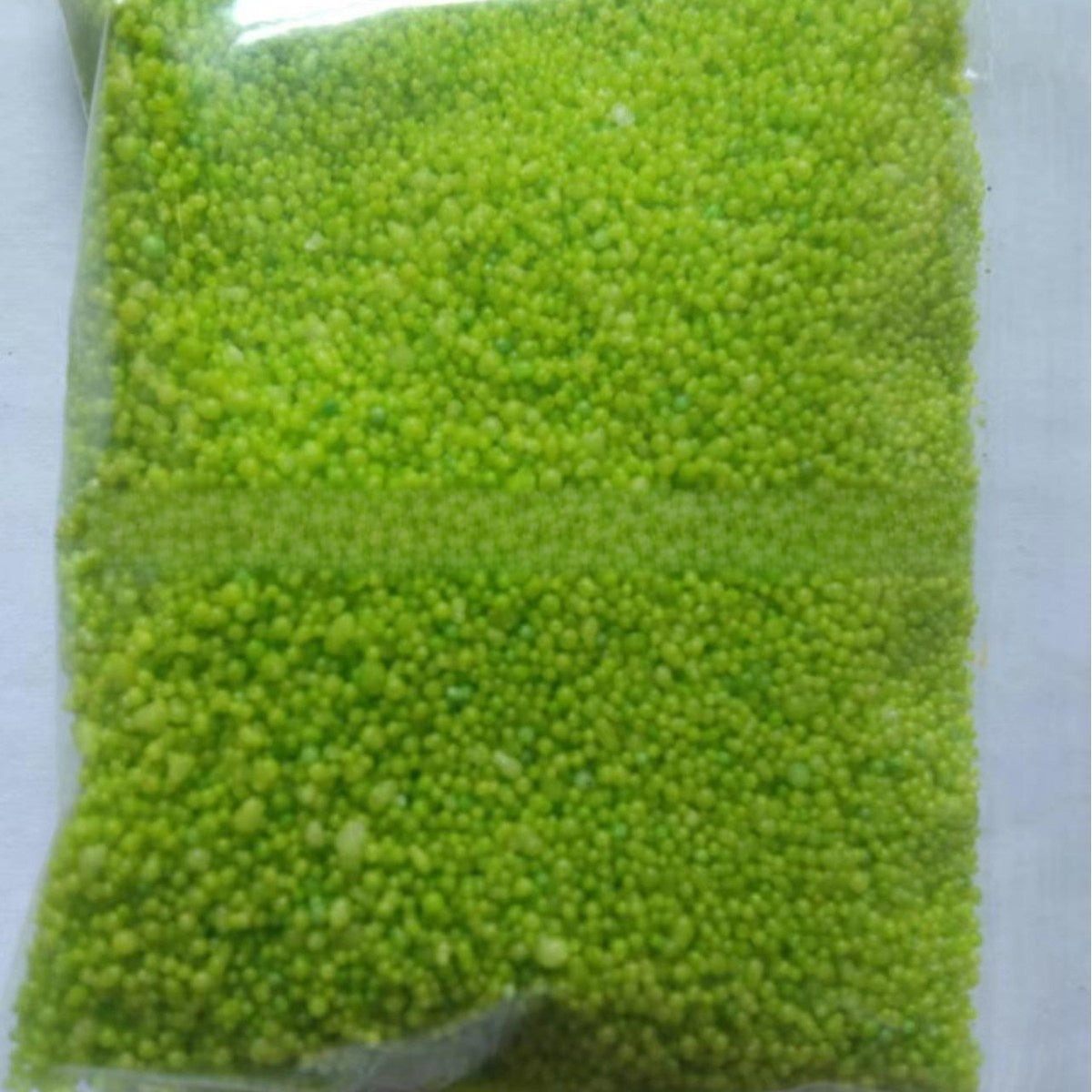 Wax sand candle particles