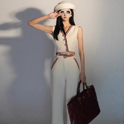 White beaded suit vest and trousers