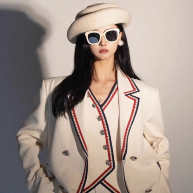 White beaded suit vest and trousers