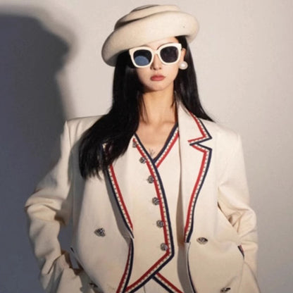 White beaded suit vest and trousers