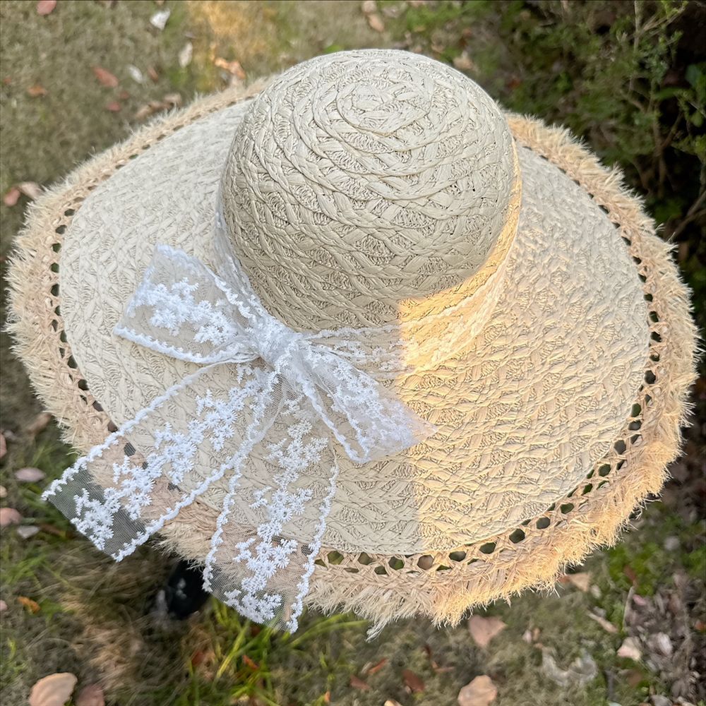 Wide Brim Straw Sun Hat with Floral Decoration