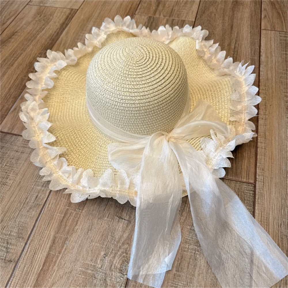 Wide Brim Straw Sun Hat with Floral Decoration