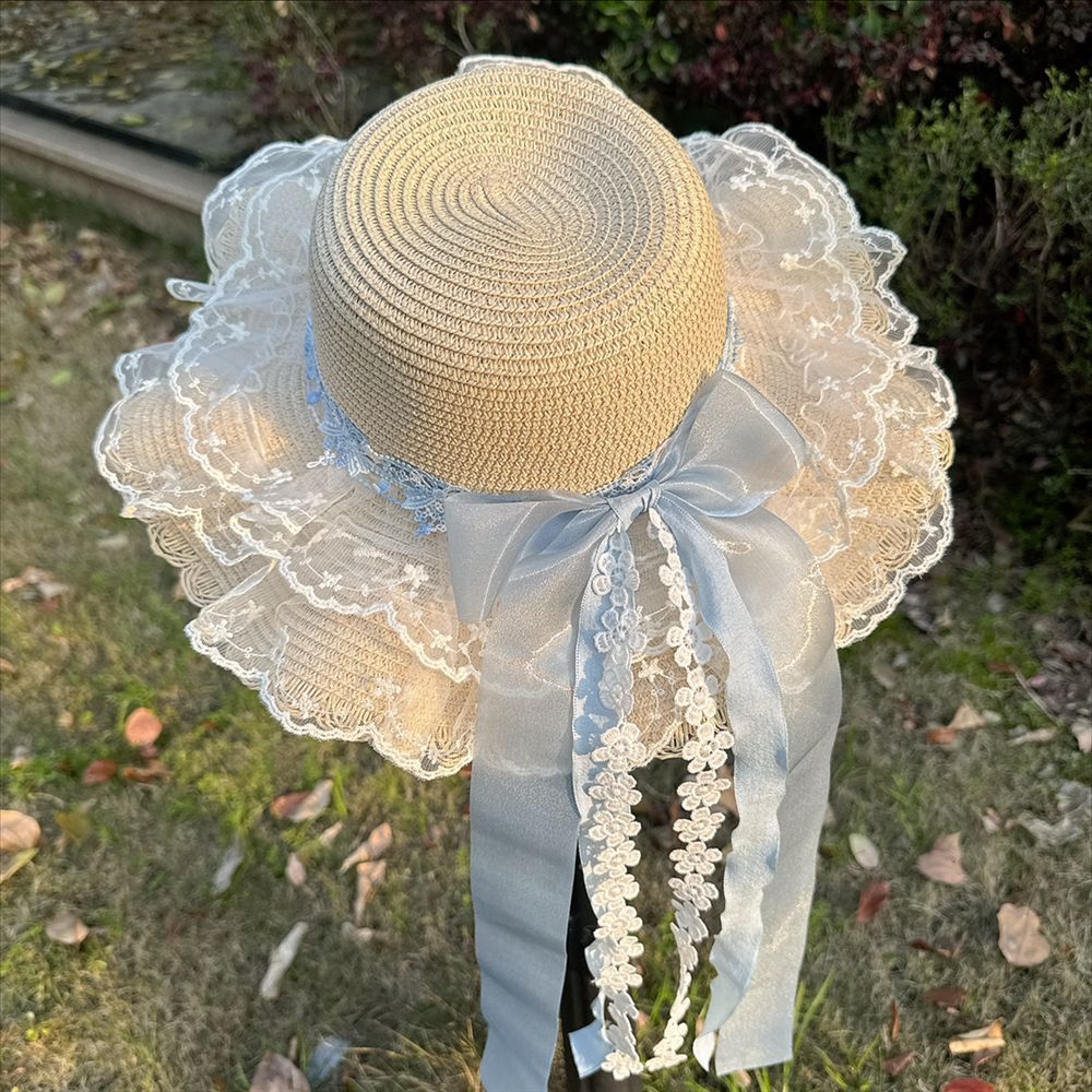 Wide Brim Straw Sun Hat with Floral Decoration