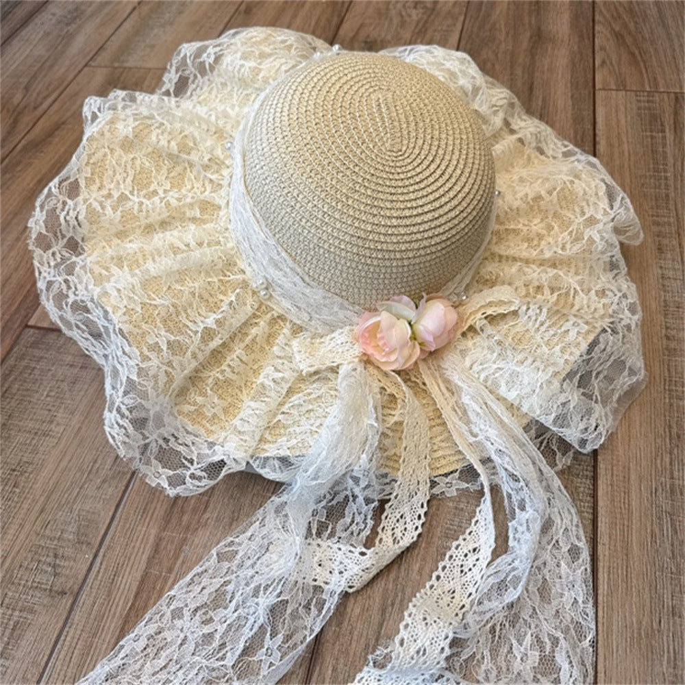 Wide Brim Straw Sun Hat with Floral Decoration