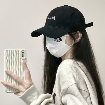 Wide-brimmed cap