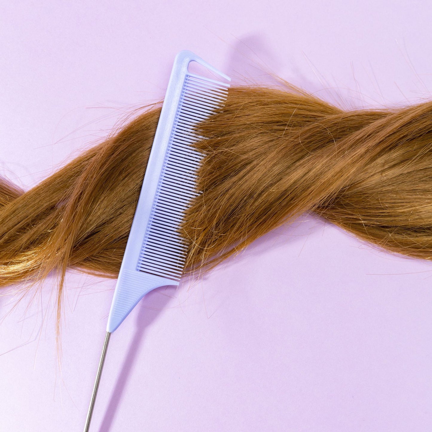 Wig comb with zone divisions