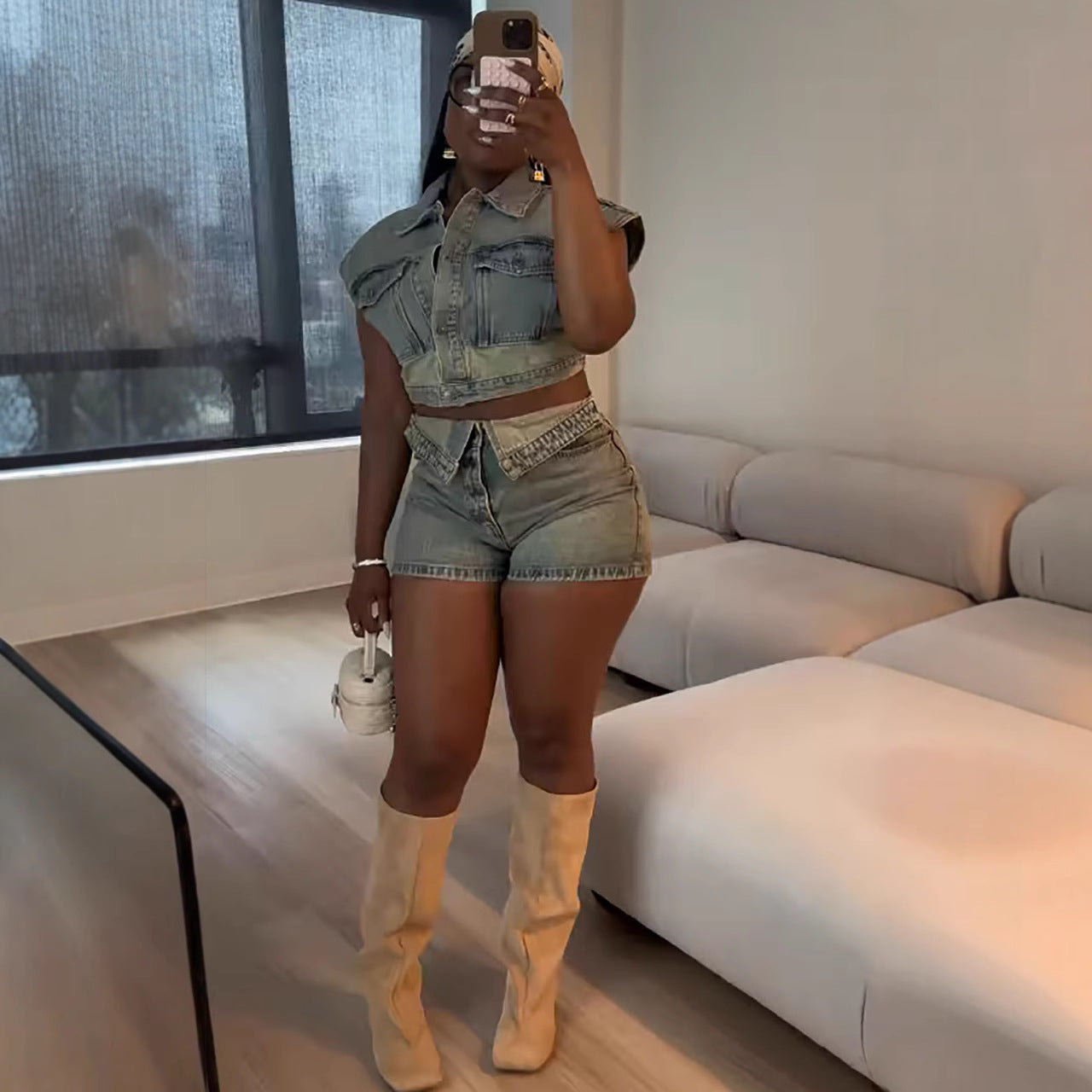Women's denim jacket and high-waisted shorts