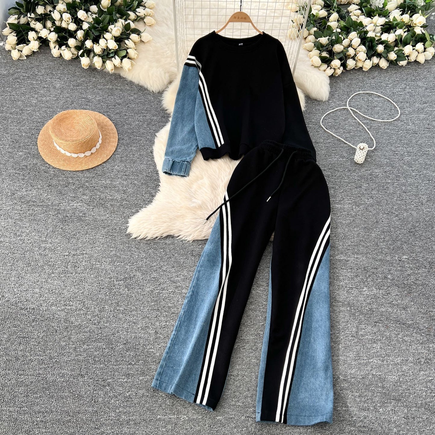 Women's round-neck hoodie and high-waisted denim patchwork trousers