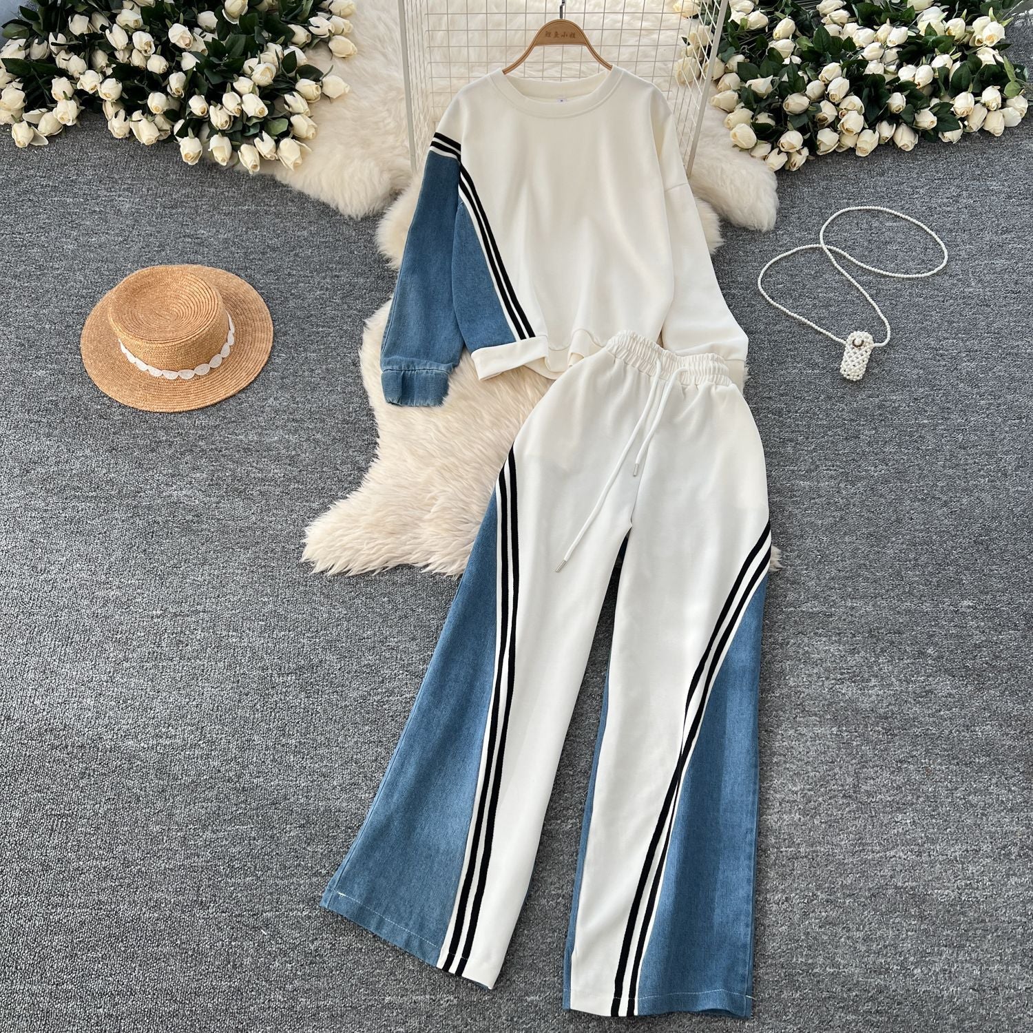Women's round-neck hoodie and high-waisted denim patchwork trousers