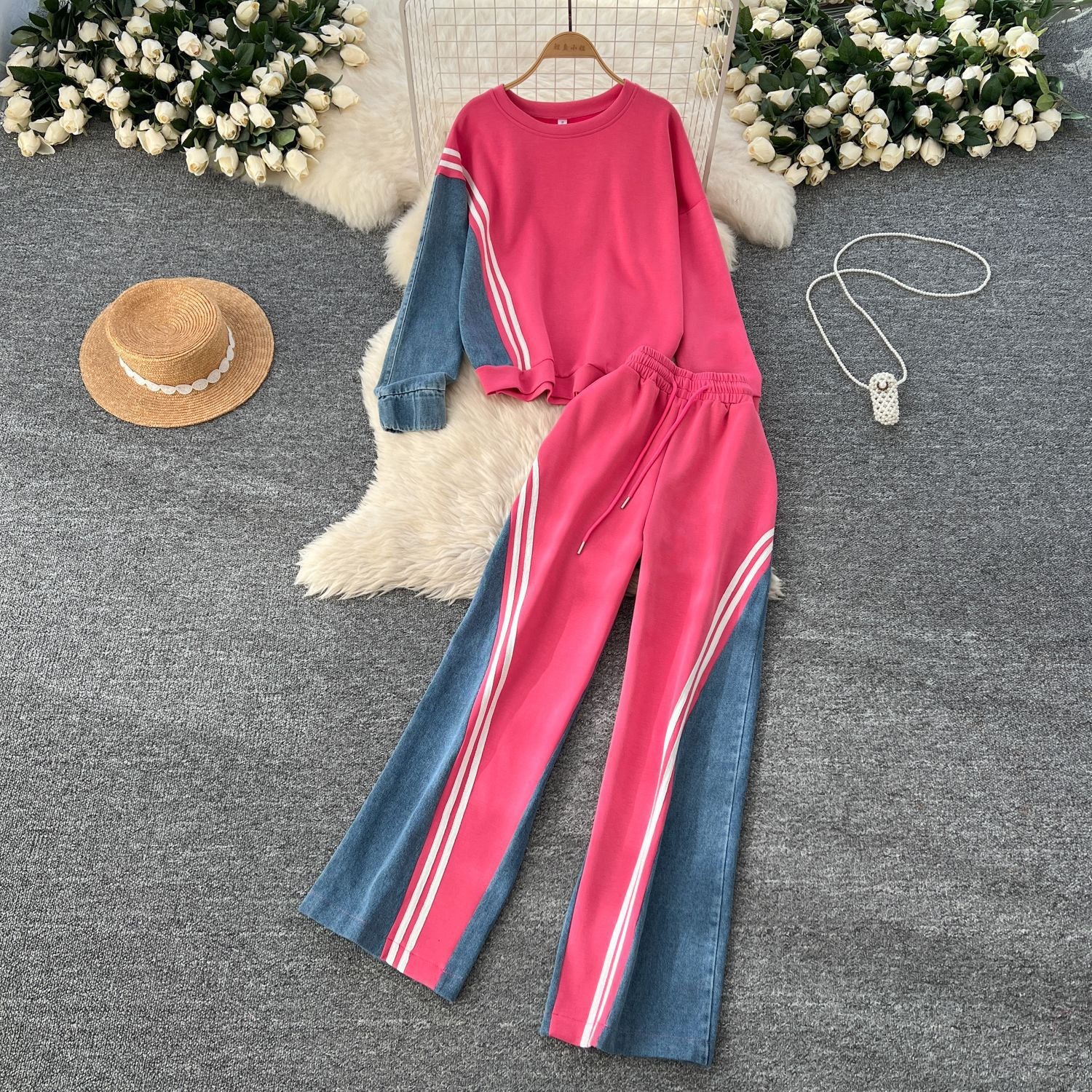 Women's round-neck hoodie and high-waisted denim patchwork trousers