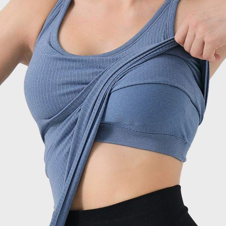 Women's sports vest with built-in chest pad