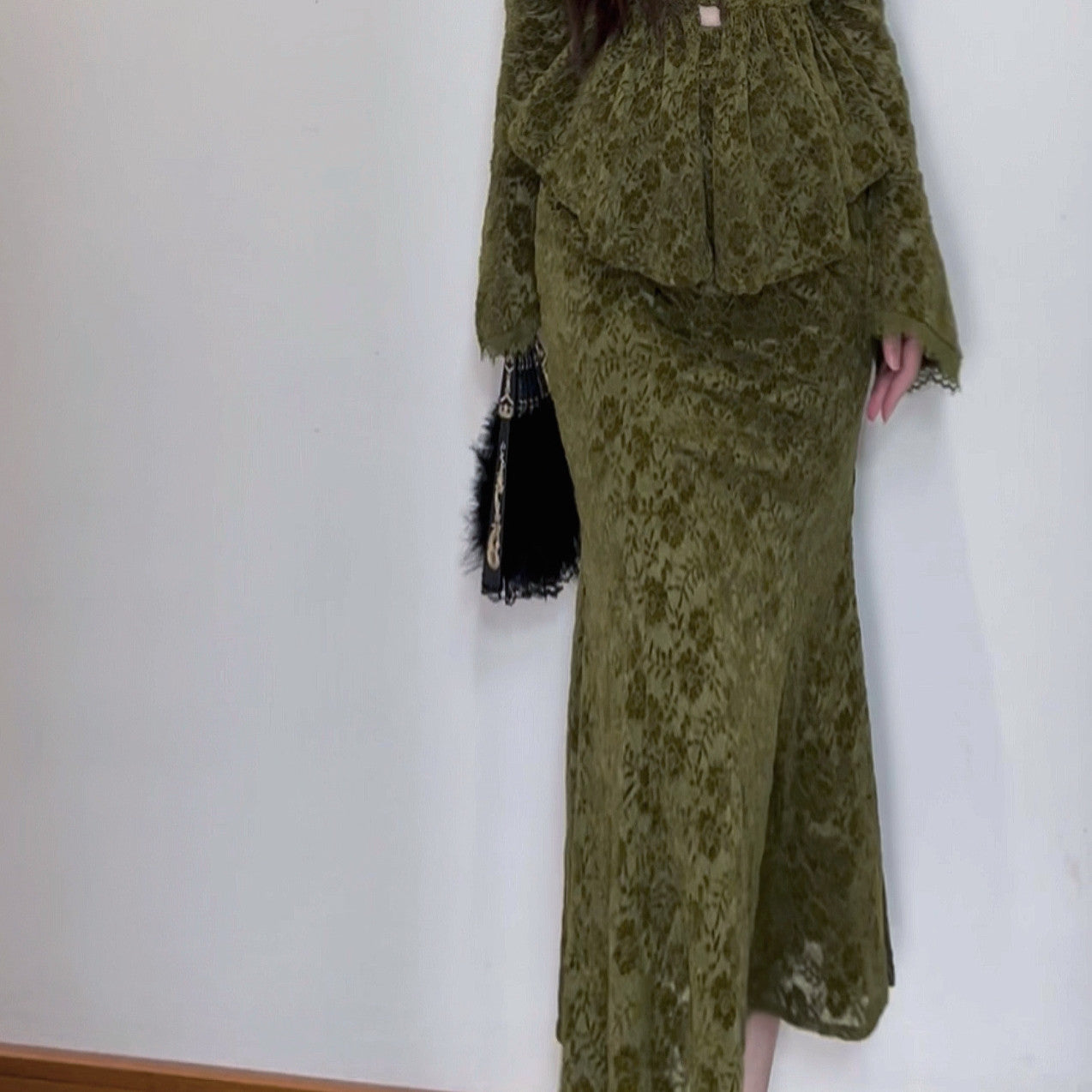 Women's two-piece set: long-sleeved top and high-waisted skirt