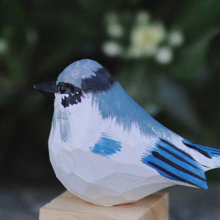 Wood-carved bird
