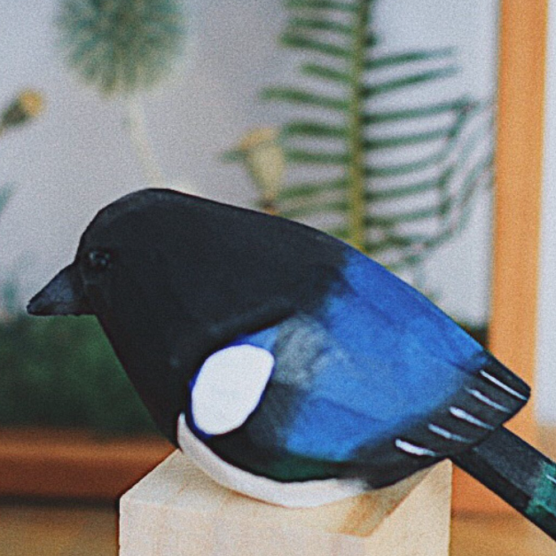 Wood-carved bird
