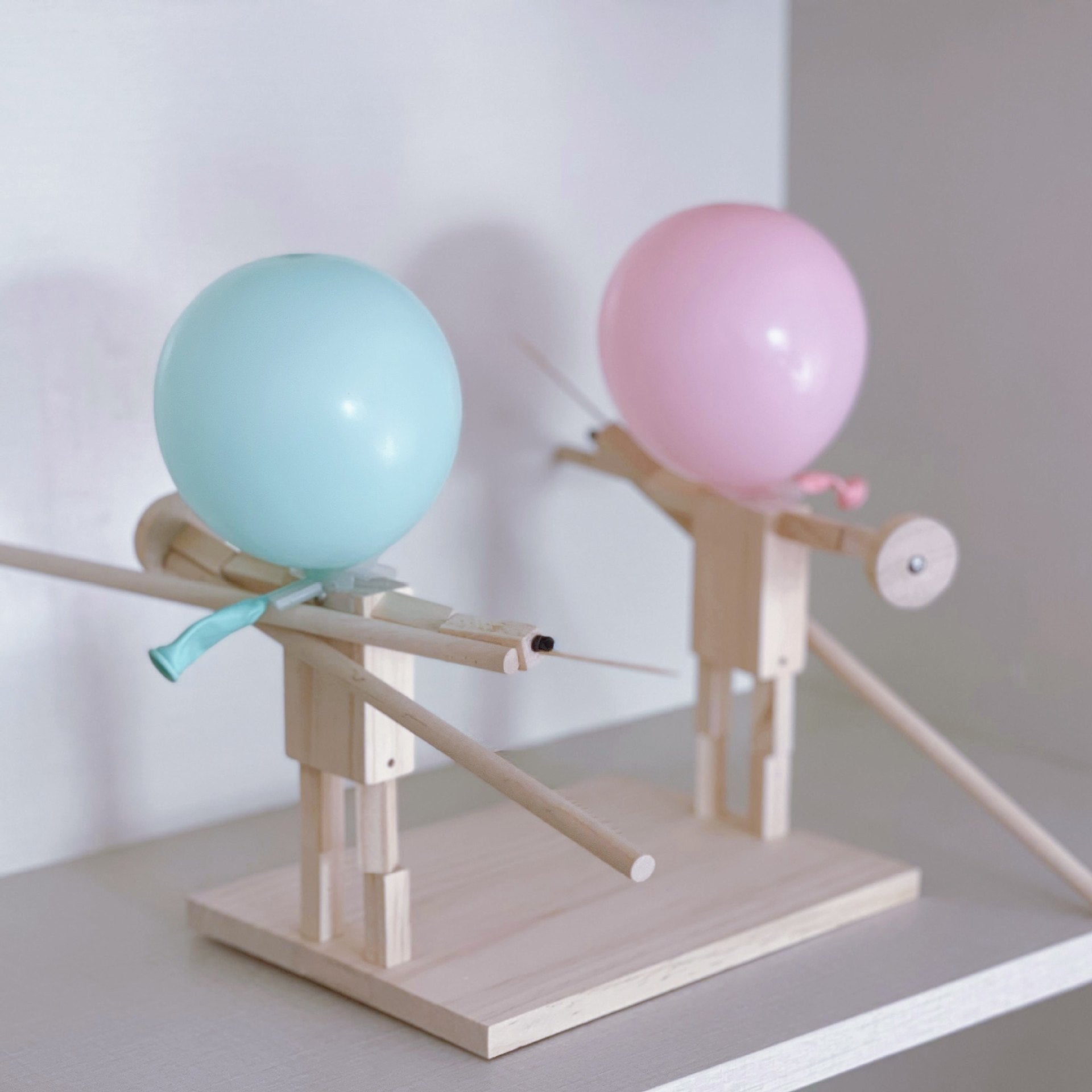 Wooden battle toy