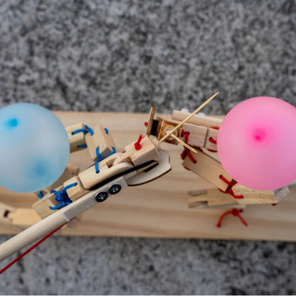 Wooden Dueling Figurine Set with Balloons