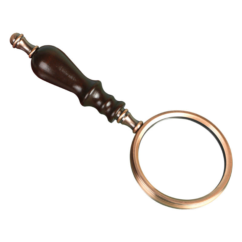 Wooden-handled hand magnifier