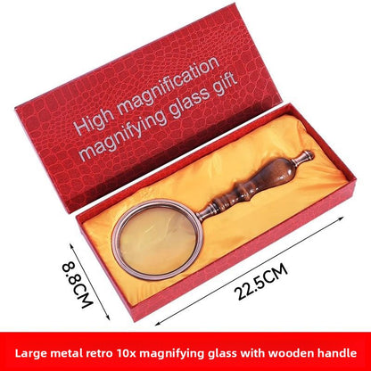 Wooden-handled hand magnifier