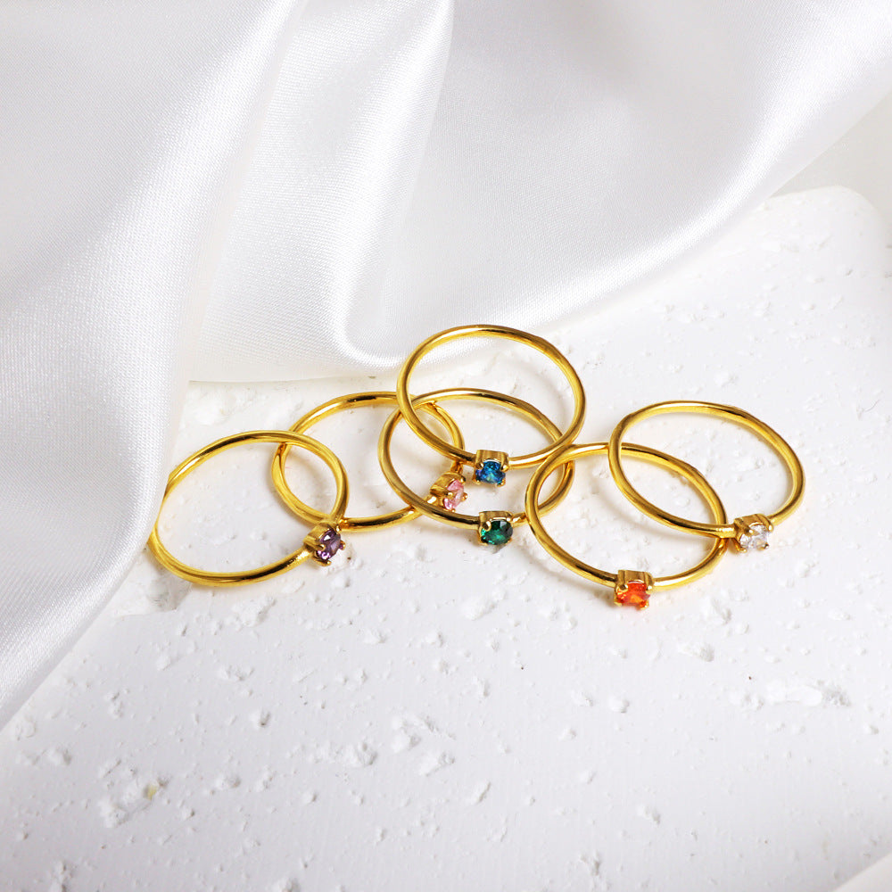 Zircon color-diamond ring